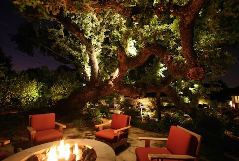 comfy-upholstered-chairs-also-fire-pit-design-and-awesome-garden-lighting-on-trees-idea-arm-chai.jpg